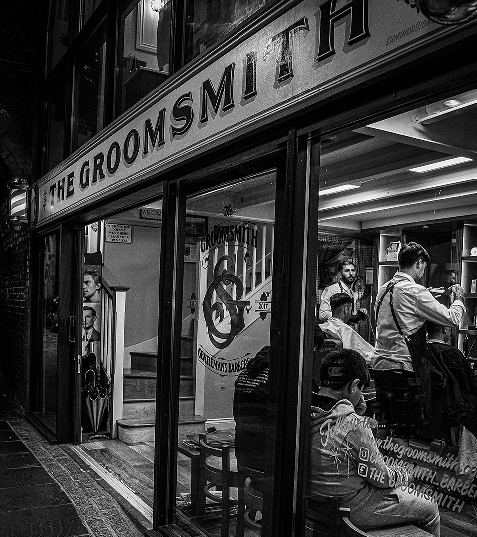 The Groomsmith Barbershop at night